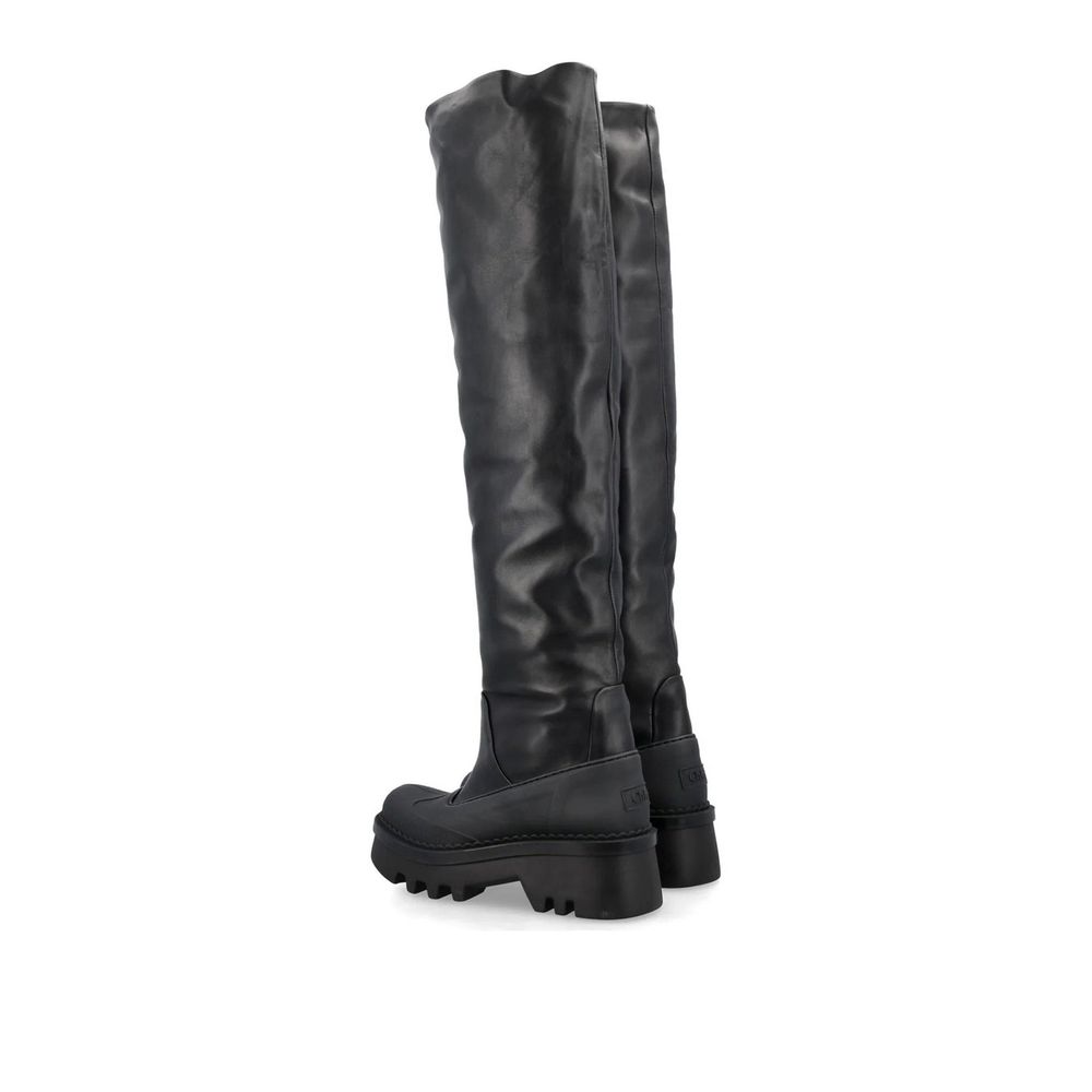 Black Leather Over The Knee